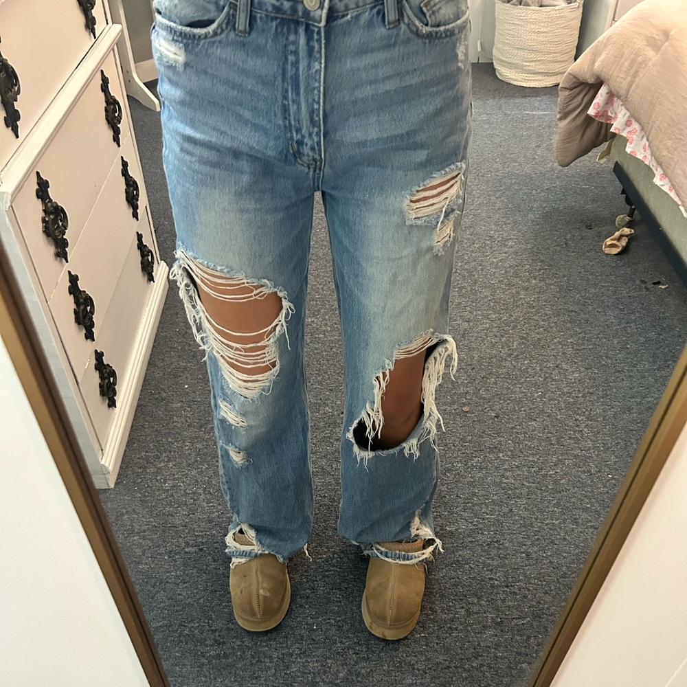 Ripped Altr’d State blue jeans.